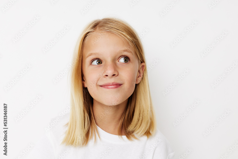 Beautiful little girl with blond hair posing studio Beautiful little girl with blond hair posing studio