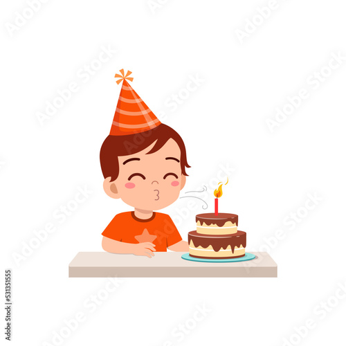 little kid blow candle on birthday party