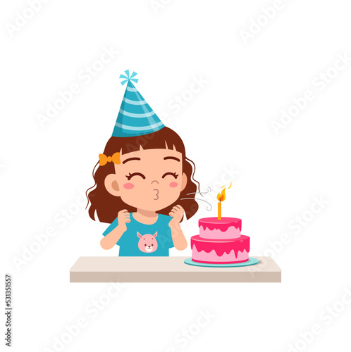little kid blow candle on birthday party