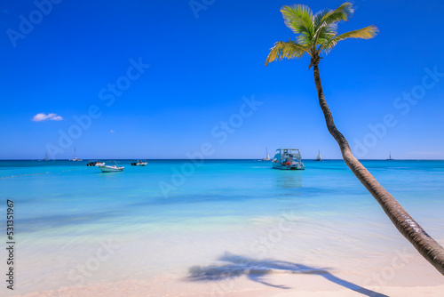 Tropical idyllic caribbean beach with sailboats, Punta Cana, Dominican Republic