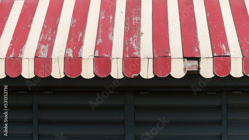 vintage decorative wood awning at the concession cabin in the park photo
