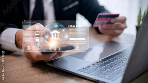 Online payment,Man's hands holding smartphone and using credit card for online shopping.