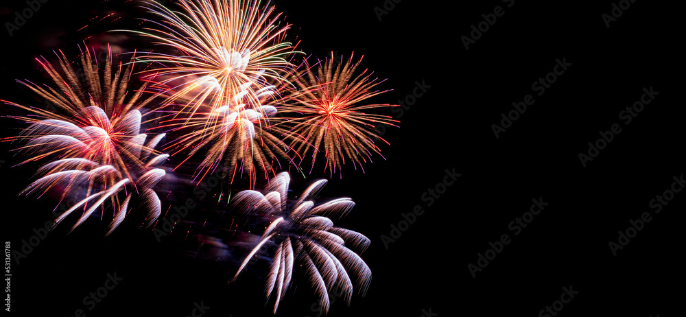 Fireworks - light festive show. Bright rays of light on black background of night sky. Fireworks. Fireworks - light festive show. Bright rays of light on black background of night sky. Fireworks.