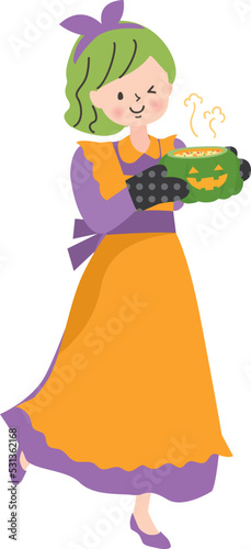 秋野菜で作ったハロウイン料理と仮装した女性