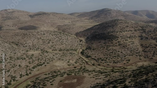 Aerial view over Samaria desert mountains 

Northern Samaria, Drone shot of arid landscape, Israel
