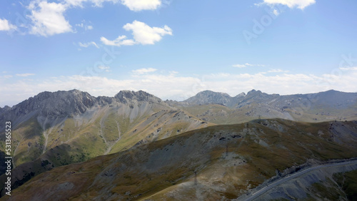 View from the height of the mountains of Kyrgyzstan. Beautiful mountain landscape.