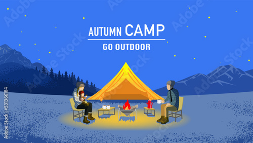 Young family enjoying night camp in autumn - Included words