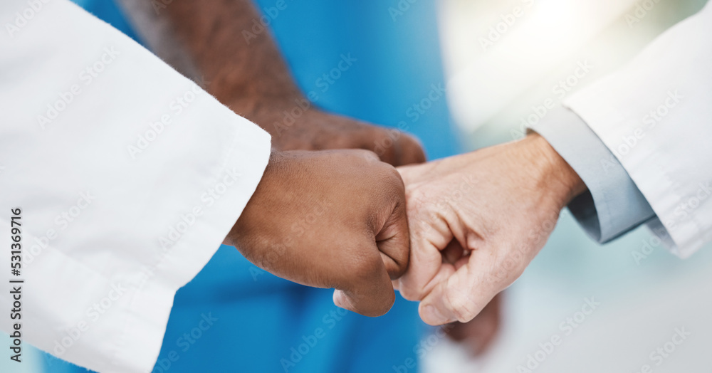 Fist bump hands, healthcare teamwork and group support for medical goals, collaboration and mission. Closeup doctor group motivation, partnership and success celebration for medicine solidarity trust Fist bump hands, healthcare teamwork and group support for medical goals, collaboration and mission. Closeup doctor group motivation, partnership and success celebration for medicine solidarity trust