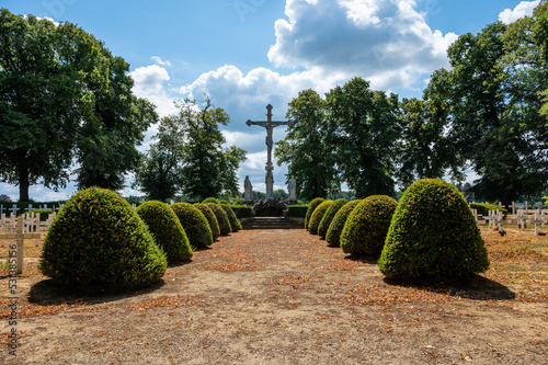 Heverlee, Flemish Brabant, Belgium - Lines and yellow meadows of the cemetery with a natural background photo