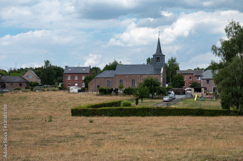 Saint-Servais, Wallon Region, Belgium - Rural scene with village view over farmland