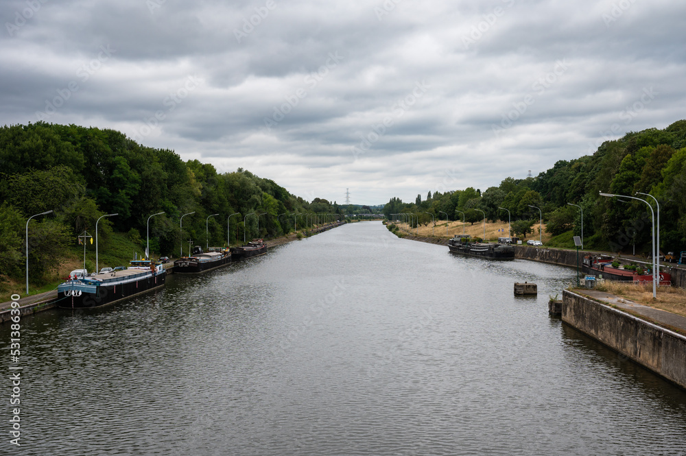 Fototapeta premium Ronquieres, Wallon Region, Belgium , Canal with boats and industrial activity