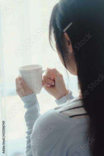 woman drinking coffee in morning