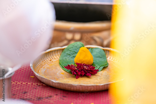 South Indian Tamil wedding ceremony ritual items and hands close up photo