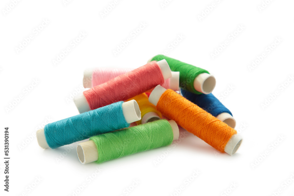 Color sewing threads isolated on white background. Color sewing threads isolated on white background.