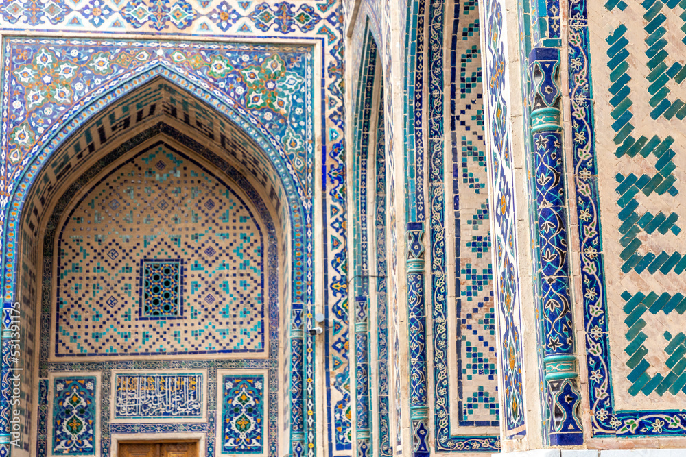 The pattern on the wall of the madrasah. Registan square. Samarkand city, Uzbekistan.