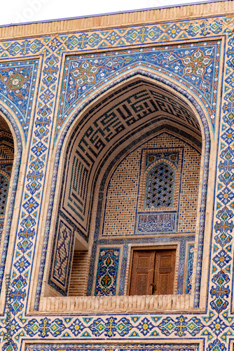 The pattern on the wall of the madrasah. Registan square. Samarkand city  Uzbekistan.