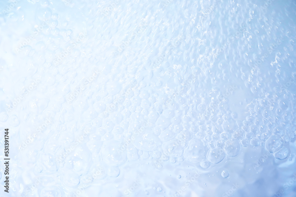 Blue water texture. Bubbles and bubbling water.