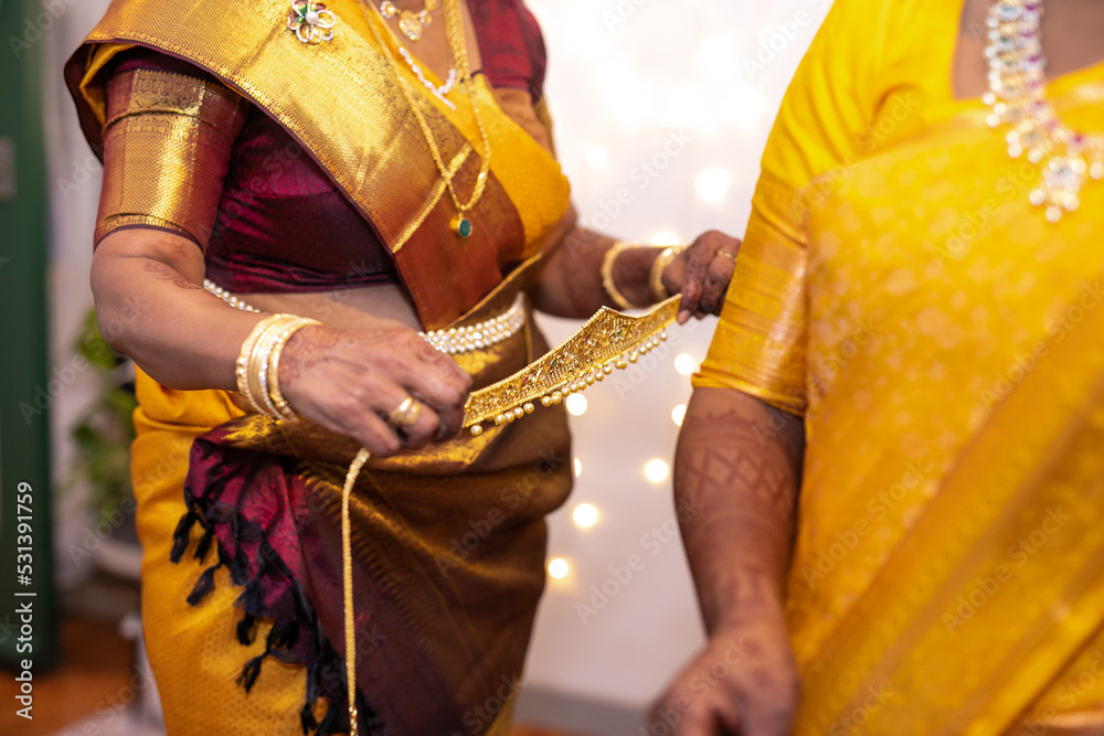 South Indian Tamil bride's traditional wedding golden belt close up