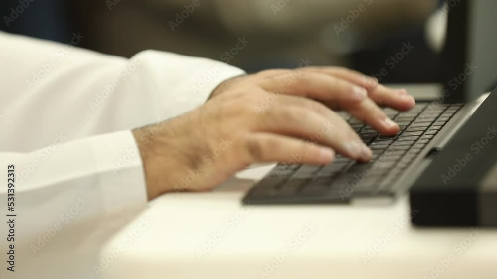 person typing on a laptop computer person typing on a laptop computer
