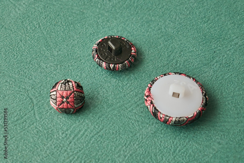 handmade buttons with an abstract print © Mykhailo
