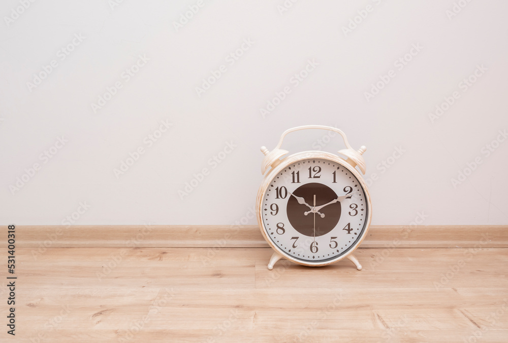 clock on hardwood floor, front view clock on hardwood floor, front view