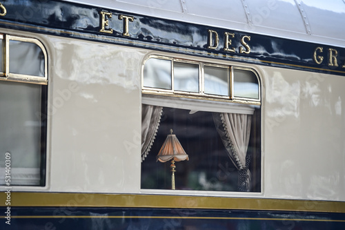 Fotografiet Famous Orient Express long distance passenger train stopped in Bucharest central train station