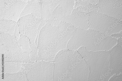 Grungy texture white concrete plaster wall Background.
