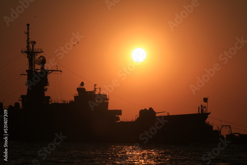 sunset over military ship © FarazHabiballahian