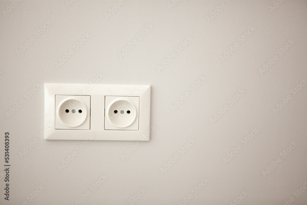 white electrical socket mounted on the wall white electrical socket mounted on the wall