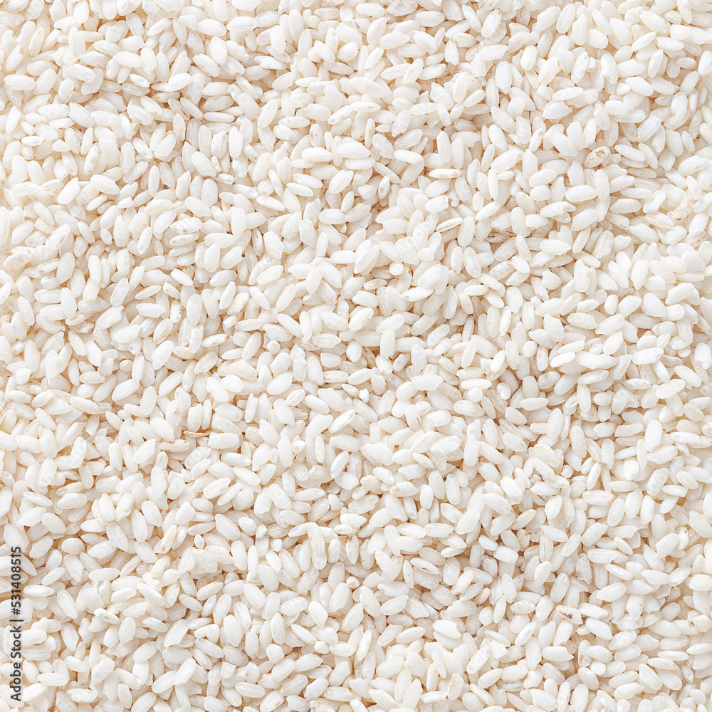 Uncooked arborio rice background Uncooked arborio rice background