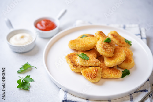 Fresh prepared nuggets with sauces