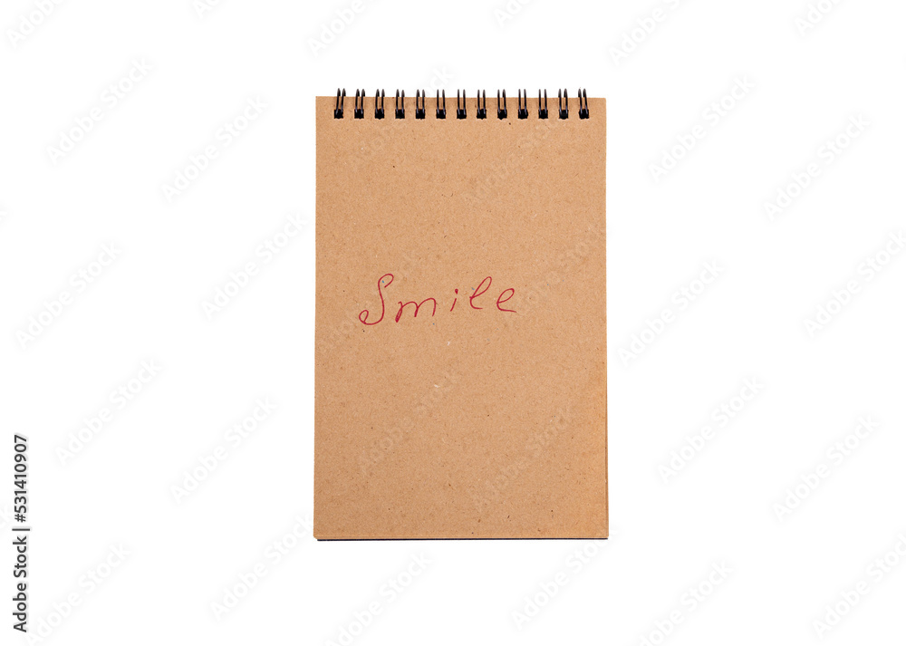 Positive statements. A phrase on a note sheet on a white background. Motivational concept with handwritten text. Craft notebook. phrase Smile Positive statements. A phrase on a note sheet on a white background. Motivational concept with handwritten text. Craft notebook. phrase Smile