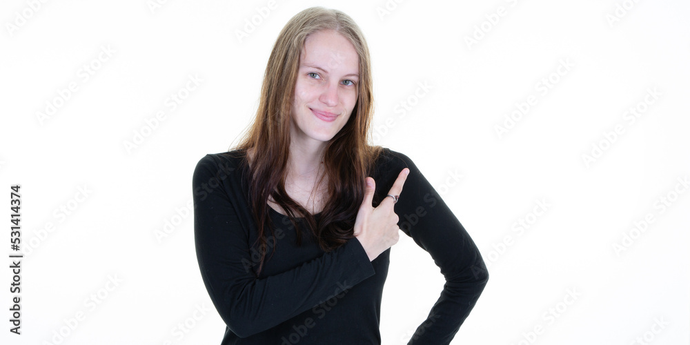 Young blonde woman over isolated white background pointing finger hand on side blank copy space Young blonde woman over isolated white background pointing finger hand on side blank copy space