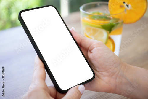 woman hand holding phone with isolated screen background orange lemonade