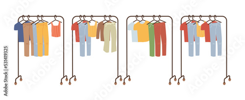 Men and women clothes hanging on rack and hangers. Isolated shopping store assortment. Tshirts and trousers, blouses and pants. Vector in flat cartoon style