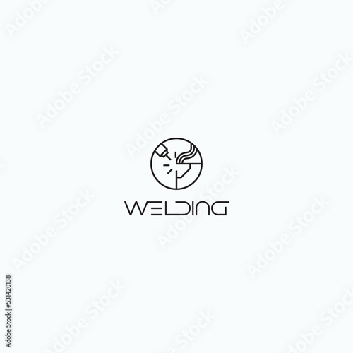
illustration consisting of an image of the welding process in the form of a symbol or logo