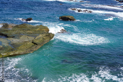 Waves crushing the rocks on the beach