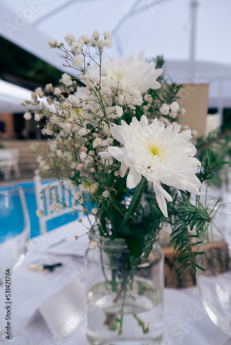 Various wedding decorations with white flowers