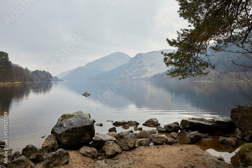 Looking south from Jubilee Point, on a late March evening, gentle rain begins to fall on the reflective still surface of Loch Eck. Argyll and Bute photo