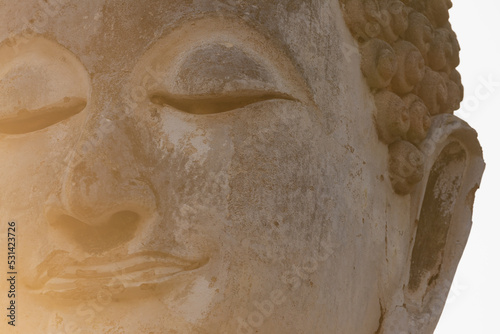 Close-up of the face of a Buddha statue in a temple in Sukhothai Historical Park