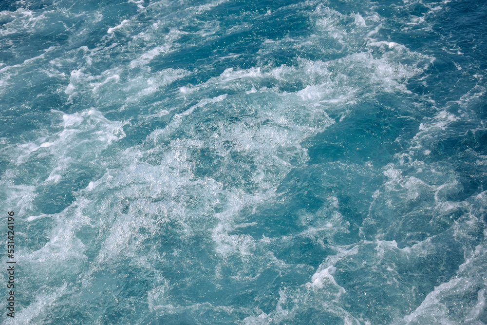 Sea view from stern of yacht. Trace on water from yacht's engine. Sea foam. Copy space. Close-up. Selective focus. Sea view from stern of yacht. Trace on water from yacht's engine. Sea foam. Copy space. Close-up. Selective focus.