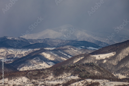 Winter landscape with forested hills from Maramures. (Transylvania, Romania)  © AlexandruClaudiu