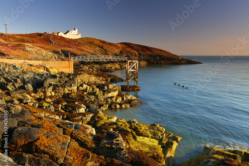 Warm Morning light on Point Lynas Lighthouse. Anglesey, North Wales, UK.