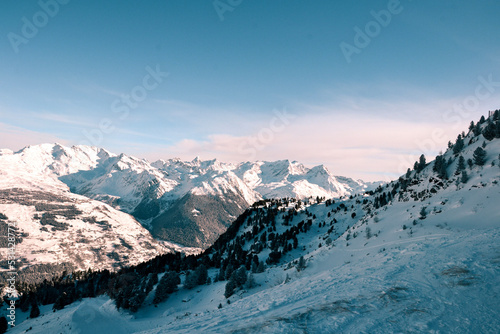 Snow-capped mountain range © Joffrey