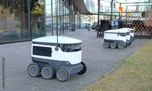 Autonomous delivery robot on Tallinn, Estonia. Estonian company developing autonomous delivery vehicles. Concept of future, technology, unmanned courier robot.