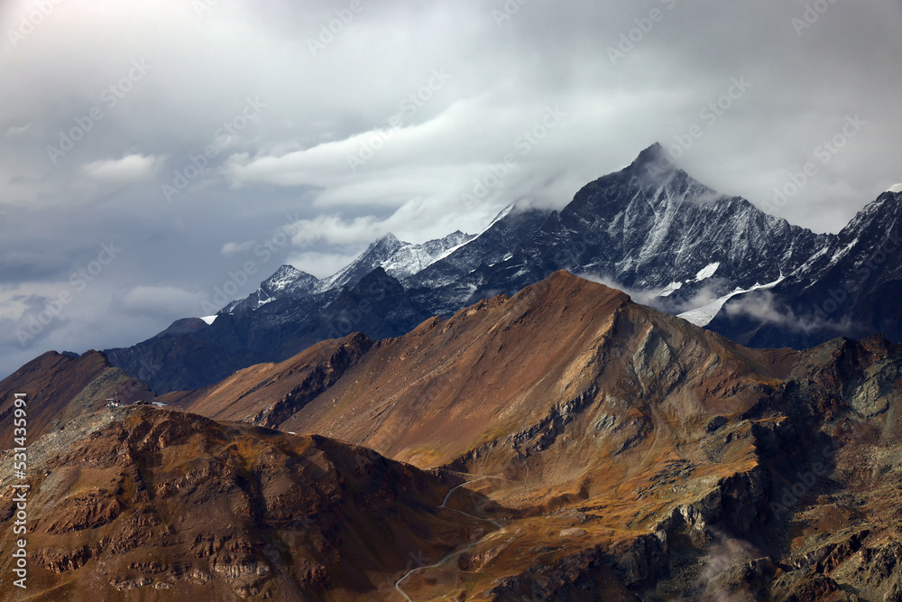 Stormy summer landscape of the Pennine Alps in Switzerland, Europe Stormy summer landscape of the Pennine Alps in Switzerland, Europe