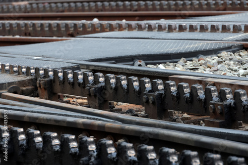 Close-up of a railroad track with a rack 