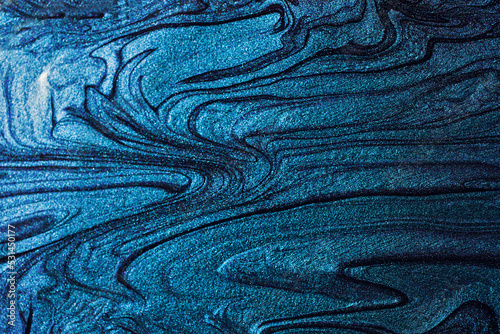 Elegant marble navy blue background,make from liquid nail polishes.Good as cosmetics backdrop.