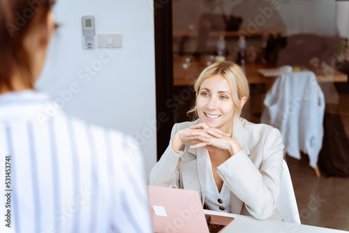 beautiful business woman working in company office with cheerfulness