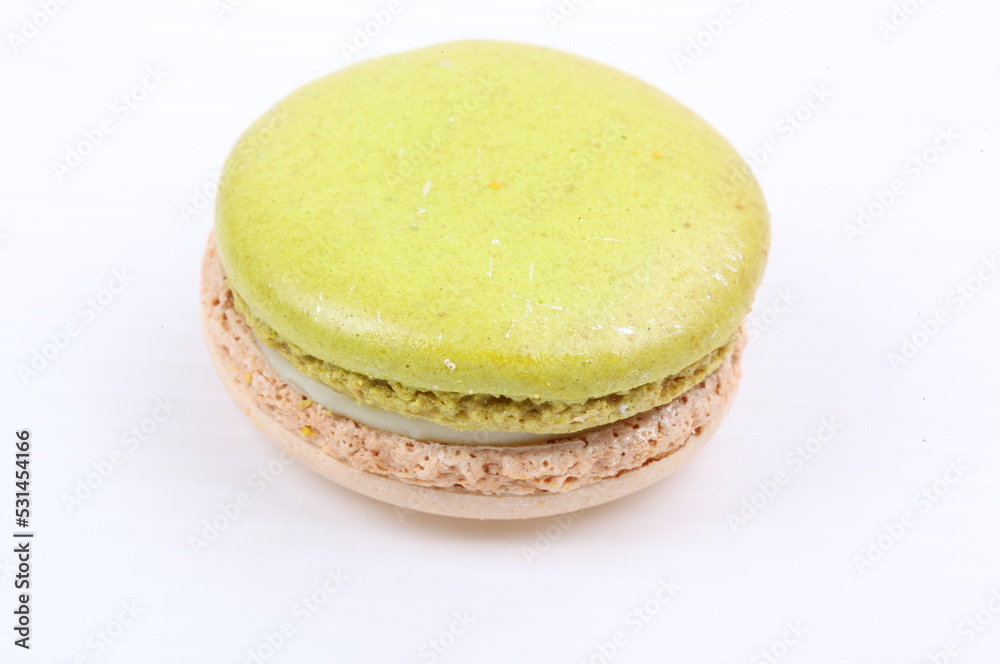 Green macaron isolated in white background Green macaron isolated in white background
